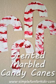 the letters are made out of candy canes and then painted to look like numbers