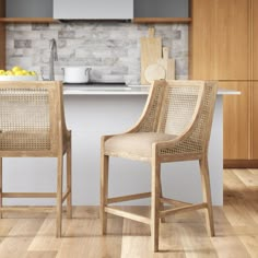 two chairs sitting next to each other in a kitchen