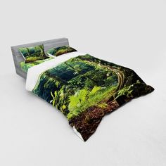 an image of a bed with green plants on it