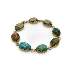 1920s 18k Gold Egyptian Revival Faience Scarab Bracelet | Chairish Scarab Jewelry, Scarab Bracelet, Ancient Languages, 18k Gold Bracelet, Scarab Beetle, Archaeological Finds, Egyptian Revival, Glazed Ceramic, Shades Of Blue