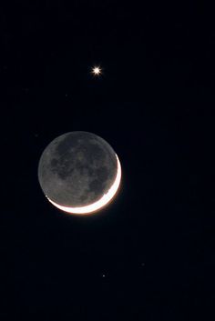 the moon and stars are visible in the night sky, with only one star visible