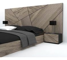 a bed with a wooden headboard and night stand next to it on a white floor