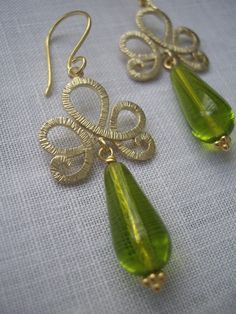 Olive Green Drops are wire wrapped and suspended on decorative golden connectors. The earrings measure 2 1/4 inches long. Aluminum Jewelry, Green Olive, Handmade With Love, Jewellery Making, Blue Stone, Pear Shaped, Earrings Handmade, Wire Wrapped, Wire Wrapping