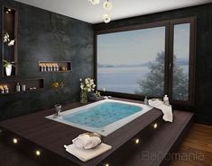 a bath room with a large jacuzzi tub next to a window