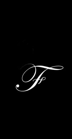 a black and white photo with the letter f in cursive writing on it