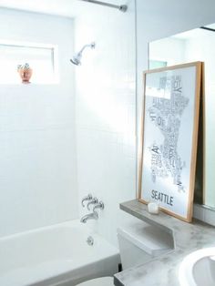 a bathroom with a sink, toilet and bathtub