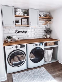 Modern laundry room nook featuring a tiled wall with cabinets, floating shelves and a wooden countertop Laundy Room, Small Laundry Room Makeover, Dream Laundry Room, Laundry Room Closet, Laundry Room Layouts, Laundry Room Renovation, Modern Laundry Rooms, Laundry Room Remodel, Laundry Room Inspiration