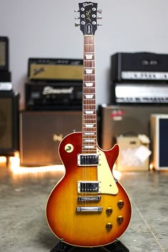 an electric guitar sitting on top of a table