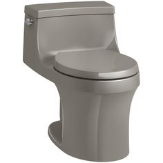 a close up view of a toilet with the lid open and seat down, on a white background