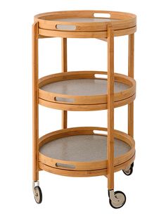 three tiered serving cart with wheels in natural wood and grey carpet on white background