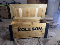 a wooden box with the name koleson on it