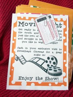 an orange and white postcard with movie quotes on it next to some other greeting cards