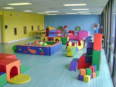 children's play area with soft foam blocks and toys