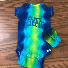 Nwt Gerber Tie-Dye Onesie And Sock Set Size 3-9 Months With “Tiny Hippie” Custom Vinyl Item #Phk3488 Tie Dye Folds, 9th Month, Custom Vinyl, Onesies, Kids Shop, Blue Green, Tie Dye, Color Blue, Dye