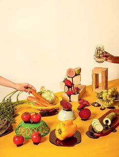 a table topped with lots of fruits and vegetables