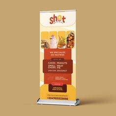 a roll - up banner with the words shot on it and images of different desserts