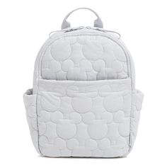 You can take a little Disney fun with you everywhere you go. And every day is a little happier and a little brighter with friends at your side. Before you head out to take on the day, pack up this scaled-down backpack that holds just what you need. Its hands-free convenience and on-trend silhouette make it a fast favorite. Features Mickey Mouse shaped quilting Exterior features two slip pockets and a zip pocket Interior features a zip pocket Zip closure Capacity 9 L. Vera Bradley Disney Small Ba Vera Bradley Lunch Bags, Disney Pumpkin, Vera Bradley Disney, Sewing Fabrics, Pack Up, Sterling Bracelets, Small Backpack, Water Repellent Fabric, Disney Fun