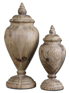 two wooden urns sitting next to each other