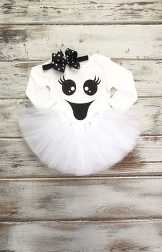 "Black and White Ghost Face First Birthday Girl Tutu Outfit!    ---------------------------------------------------------------------------------------- ♥ HEADBAND will be 16\" (age 1-2 year)  - If you need a different size please note the size needed on your order       ♥ Band is made of Black  Elastic with a 3.5-4\" Black Polka Dot Bow ♥ WHITE TUTU- has 5 layers of tulle - fits approximately age 3 months-2 years  (7\" length & 14\" waist un-stretched) ♥ BODYSUIT- Plain or Ruffle - has Black Gl Girl Ghost Face Costume, Girl Ghost Face, Ghost Face Costume, Ghost Face Shirt, Halloween First Birthday, First Birthday Outfit Girl, 1st Birthday Tutu, 1st Birthday Girl, White Tutu