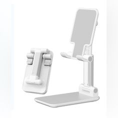 an image of a cell phone holder on the side of a white wall mounted device