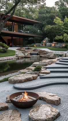 a fire pit sitting on top of a stone walkway