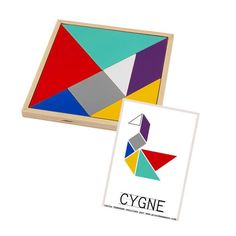 a wooden box with an image of a bird on it and a card that says cygne