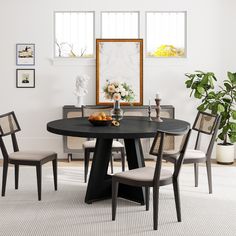 a black table with four chairs around it