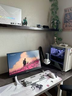 a desk with a computer, keyboard and mouse on it in front of two shelves