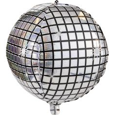 a disco ball hanging from the ceiling with black and white squares on it's sides