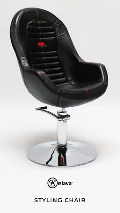 a black chair with red stitching on the back and foot rests in front of a white background