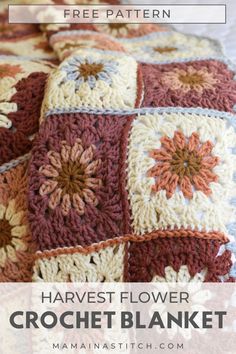 a crocheted blanket with flowers on it and the text, free pattern harvest flower crochet blanket