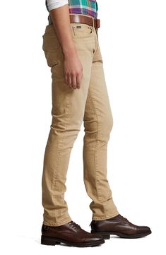 A hint of stretch means a flexible fit in versatile, modern-cut jeans set apart in a sandy khaki wash. 14" leg opening; 10" front rise; 14 1/2" back rise 98% cotton, 2% elastane Dry clean or machine wash, tumble dry Imported Khaki Stretch Mid-rise Jeans, Stretch Khaki Mid-rise Jeans, Fitted Beige Jeans With Tapered Leg, Fitted Khaki Jeans, Fitted Beige Tapered Leg Jeans, Fitted Full-length Khaki Jeans, Fitted Full Length Khaki Jeans, Fitted Beige Jeans, Fitted Beige Full Length Jeans