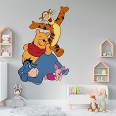 winnie the pooh and tigger wall decals in a child's room