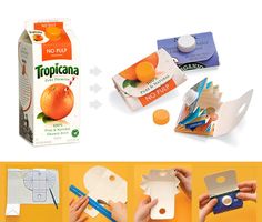 an orange juice carton with scissors and paper cut out to look like it is being used