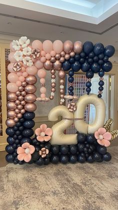 balloons are arranged in the shape of flowers and numbers for a new year's eve celebration