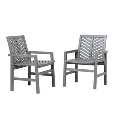 two gray chairs sitting next to each other on top of a white surface with one chair facing the other