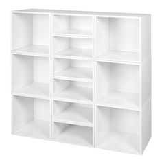 a white bookcase with six shelves on each side