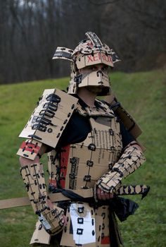 a man dressed as a knight in cardboard