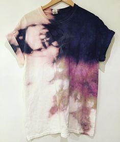 a t - shirt with an image of a woman's face on it