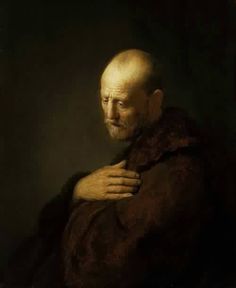 an old man with a bald head wearing a fur coat and holding his hands on his chest