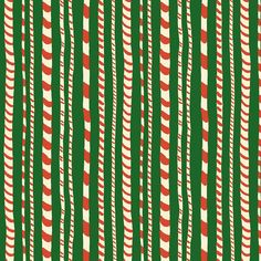 a green and red striped pattern with white stripes on it's sides, as well as an orange stripe in the center