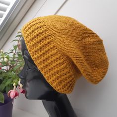 Knit hat BENESSERE golden yellow. Super cosy cotton-alpaca-mix beanie with interesting melange effect. 45% Cotton, 32% Alpaca, 23% Polyamide. Ready to ship. This hat best fits an average adult/teen head size. If you need this hat in a different size or in any other color please just let me know! All my hats are produced in a smoke-free and pets-free home. Care instruction:  Hand wash and lay flat to dry. Thank you for visiting JuliaHats! Have a nice day! Knit Slouchy Hats, Tweed Men, Knitting Hat, Knit Beret, Slouchy Beanie Hat, Soft Hats, Hand Knit Hat, Knit Alpaca, Winter Outerwear