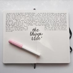 an open notebook with the words the things i love written on it next to a pink pen