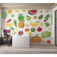 an office with fruit and vegetables painted on the wall, along with a computer chair