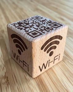 a wooden block with a wifi logo on it