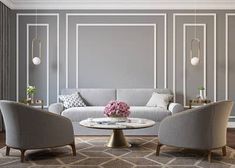 a living room with two chairs and a table in front of a gray wall that has white lines on it