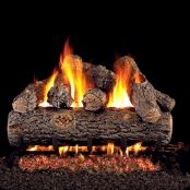 a fire burning in a fireplace with logs