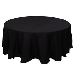 a round table with black cloth on it