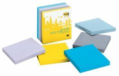 four different colored post - it notes are shown in front of each other, including one with