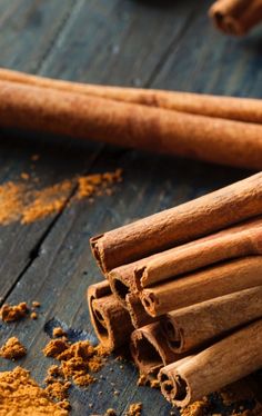 cinnamon sticks and spices on a wooden table